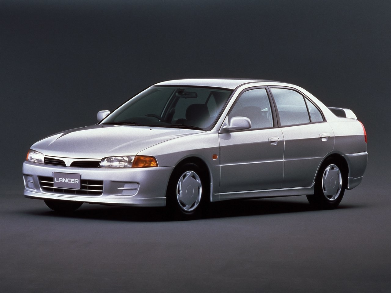 VII (1995–2000)